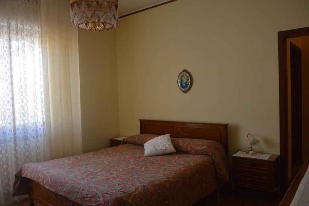 Postel nebo postele na pokoji v ubytování Appartamento in paese