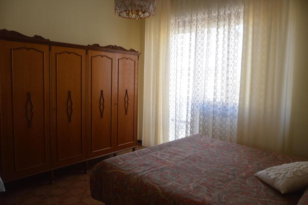 Postel nebo postele na pokoji v ubytování Appartamento in paese