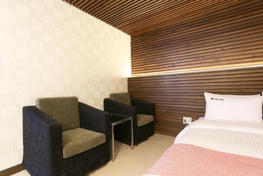 Posezení v ubytování Q Hotel