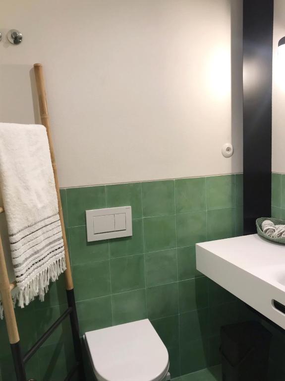 Ett badrum på Eco-lodge Villa Epicurea