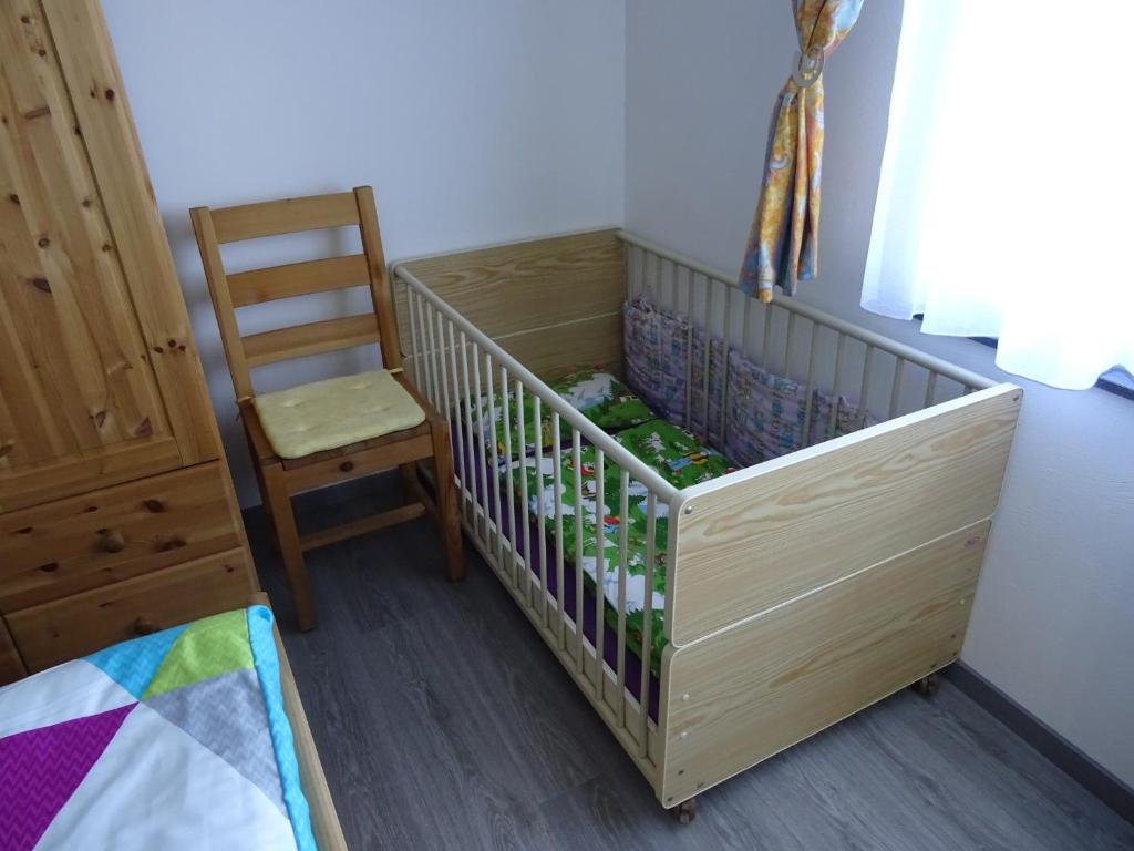 Postel nebo postele na pokoji v ubytování Am Keschtewaeldele ****