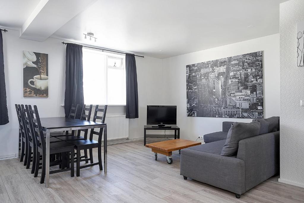 TV a/nebo společenská místnost v ubytování Stay Apartments Einholt