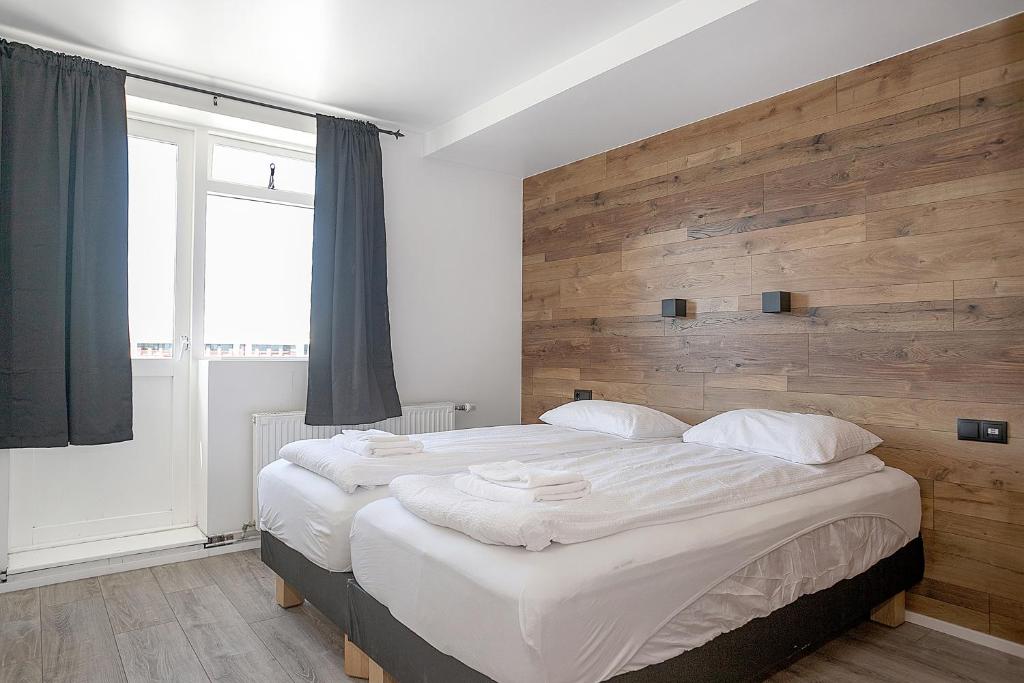 Postel nebo postele na pokoji v ubytování Stay Apartments Einholt