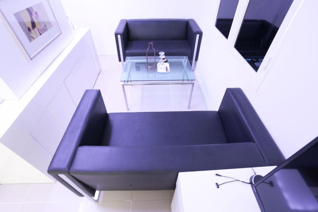 Posezení v ubytování Q Hotel