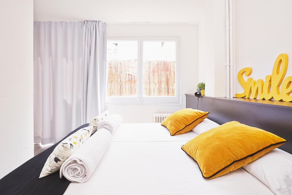 Cama ou camas em um quarto em Free Hostels Barcelona
