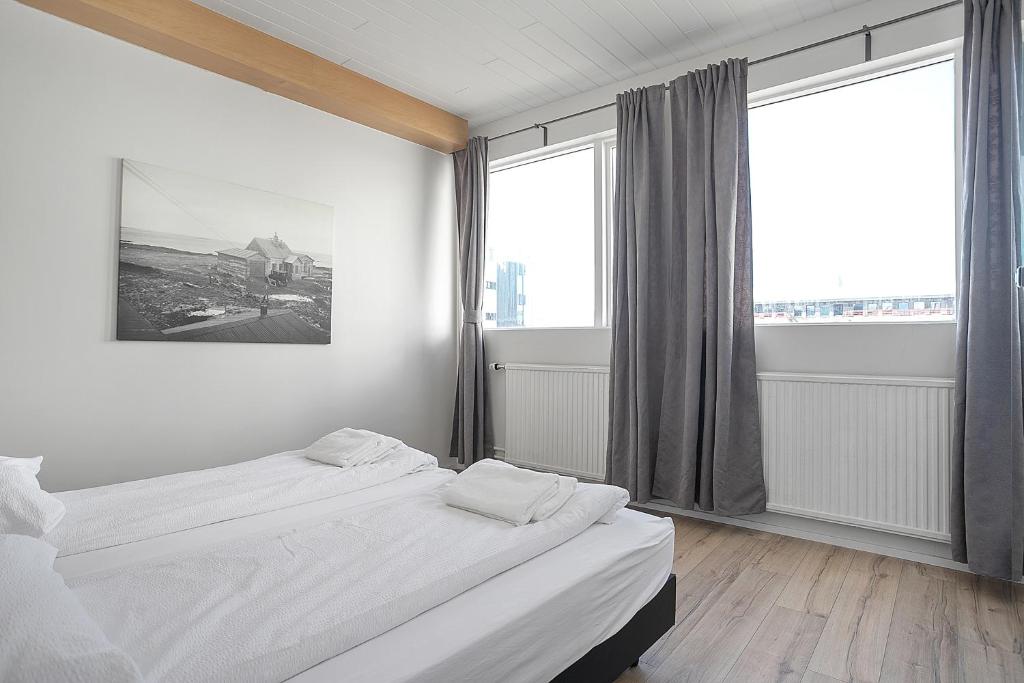 Postel nebo postele na pokoji v ubytování Stay Apartments Einholt