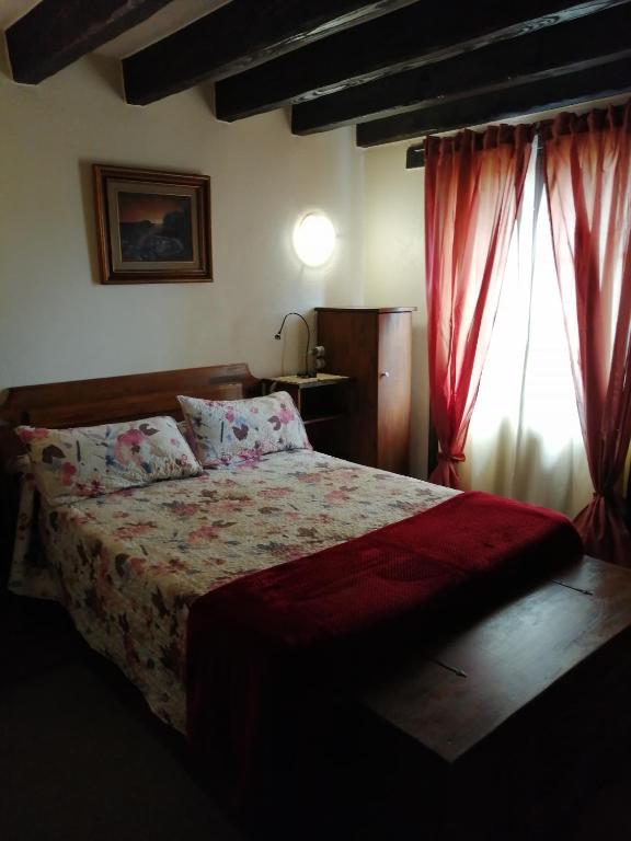 Postel nebo postele na pokoji v ubytování Agroturismo Iturbe