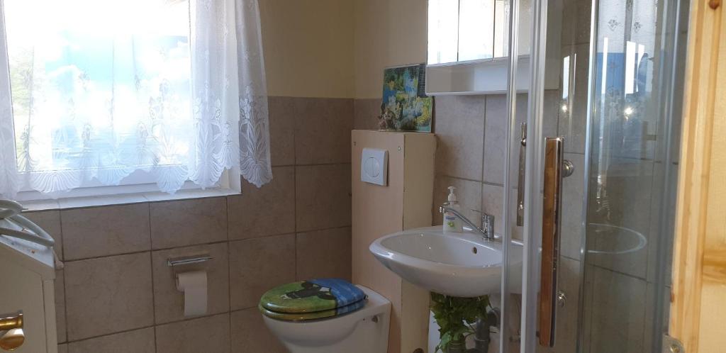 Ein Badezimmer in der Unterkunft Ferienwohnungen mit Weitblick