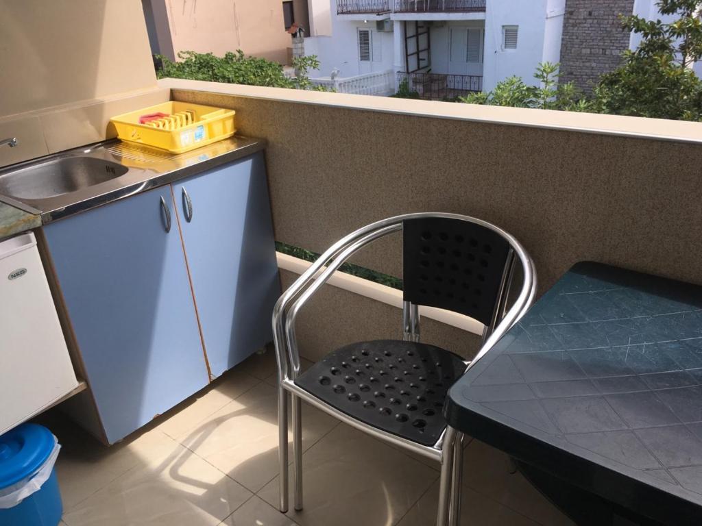 Kuchyň nebo kuchyňský kout v ubytování Apartmani Vuković