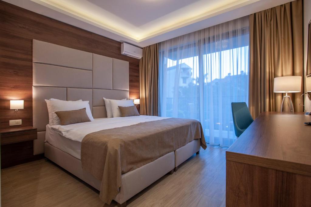 Postel nebo postele na pokoji v ubytování Hotel Twelve by Aycon