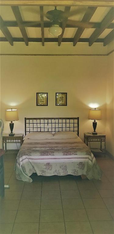 Postel nebo postele na pokoji v ubytování Playa Negra Guesthouse