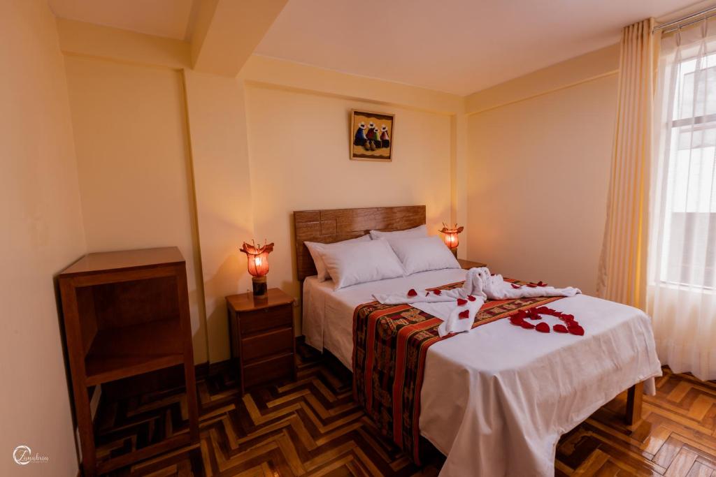 Postel nebo postele na pokoji v ubytování Quechua Hostal Recoleta