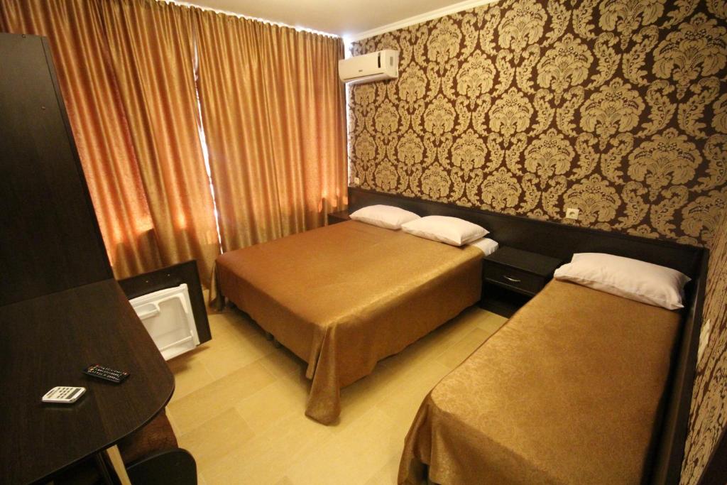 Cama o camas de una habitación en Villa Bossa