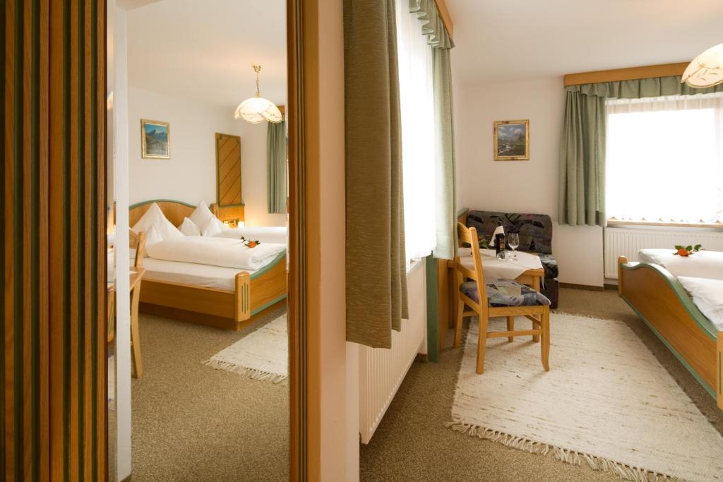 Posteľ alebo postele v izbe v ubytovaní Hotel Zita