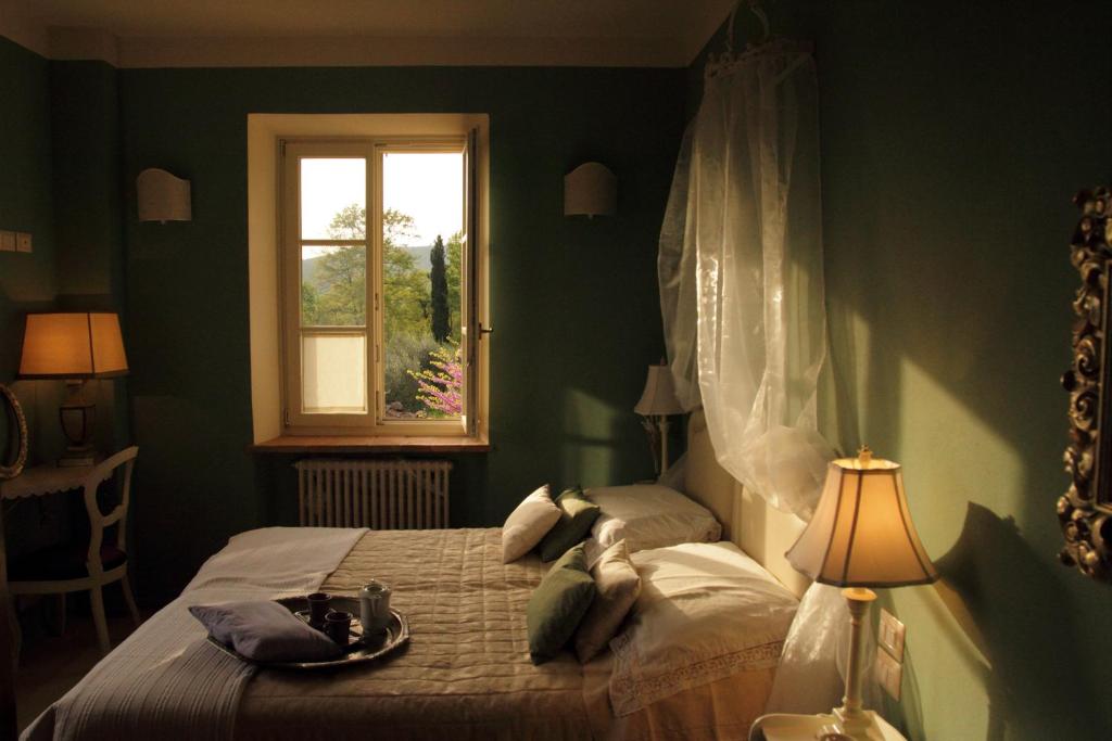 Posteľ alebo postele v izbe v ubytovaní Casa Soleluna B&B