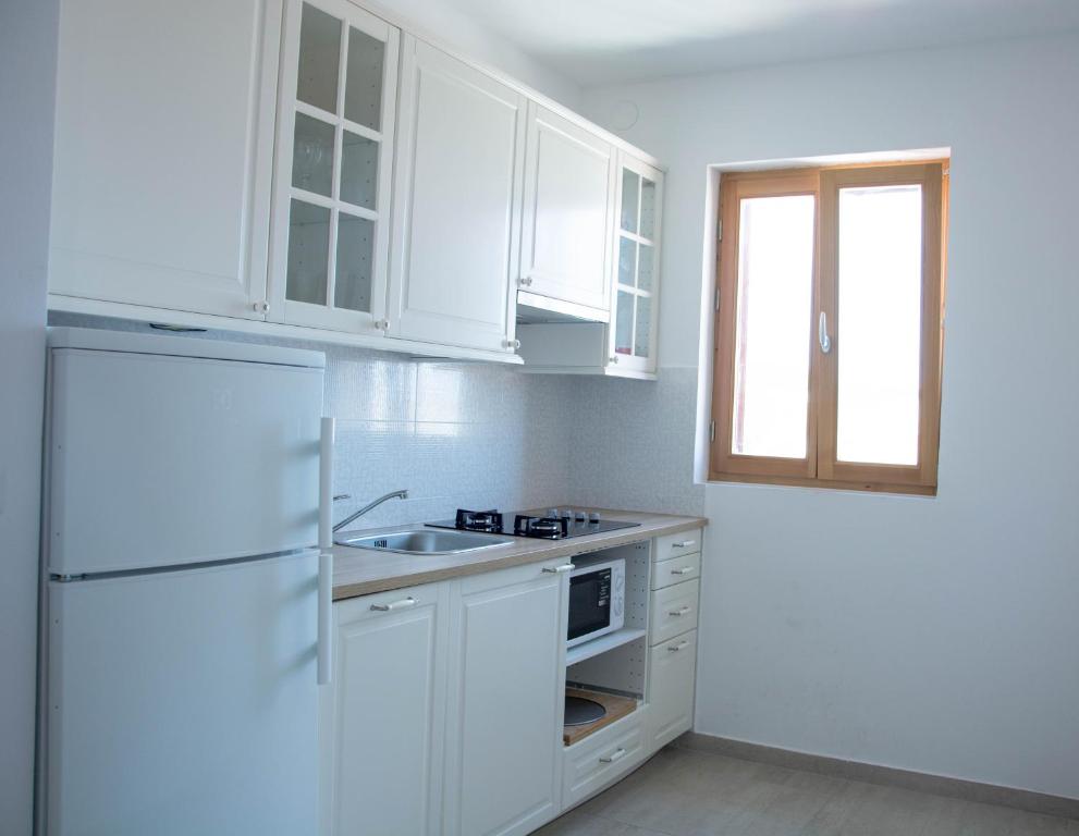 Kuchyňa alebo kuchynka v ubytovaní BUGA apartment in center of Mali Losinj