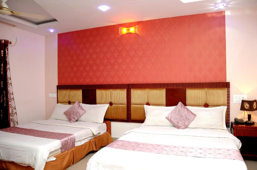 Postel nebo postele na pokoji v ubytování Hotel Kings Kastle