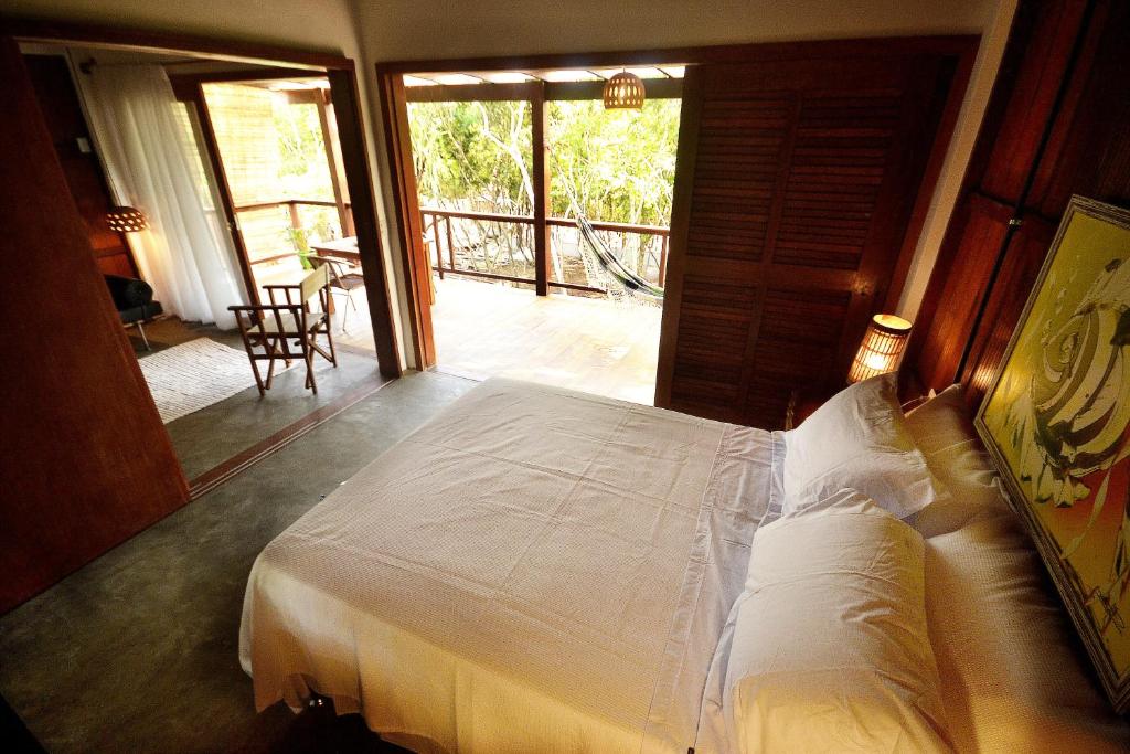 מיטה או מיטות בחדר ב-Boa Village- Bungalow Verde- Boa Village - Praia de Algodões