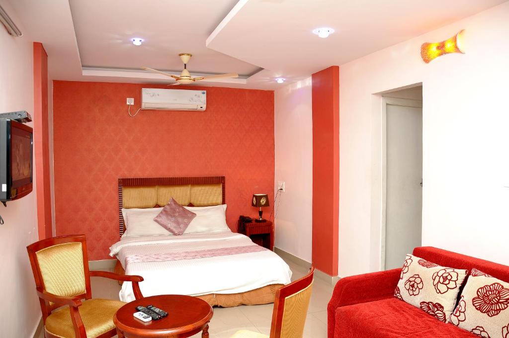 Postel nebo postele na pokoji v ubytování Hotel Kings Kastle