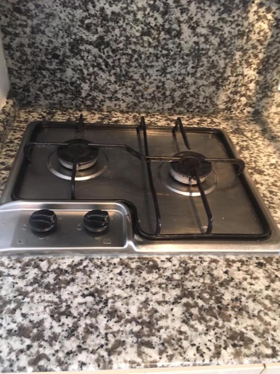 Kuchyň nebo kuchyňský kout v ubytování Suites Parque Real