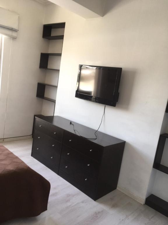 TV a/nebo společenská místnost v ubytování Suites Parque Real