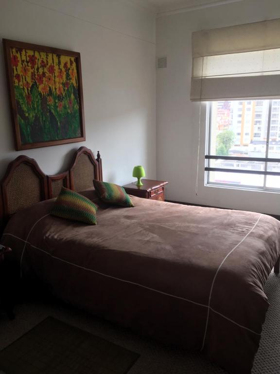 Postel nebo postele na pokoji v ubytování Suites Parque Real