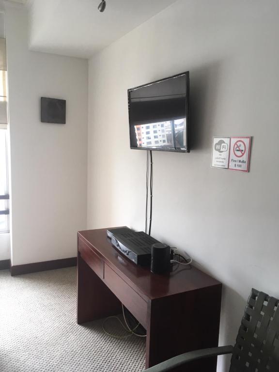 TV a/nebo společenská místnost v ubytování Suites Parque Real