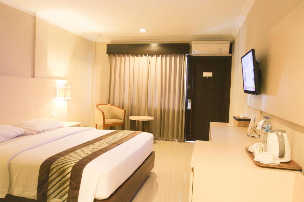 TV o dispositivi per l'intrattenimento presso Cakra Kusuma Hotel