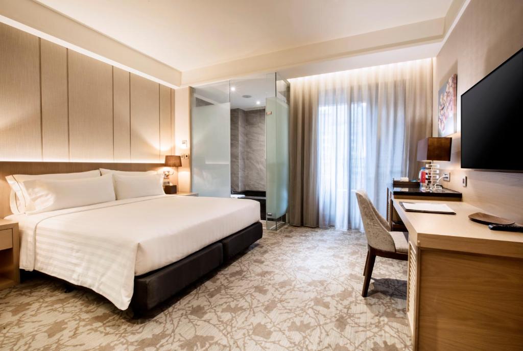 Postel nebo postele na pokoji v ubytování Hotel Valletta