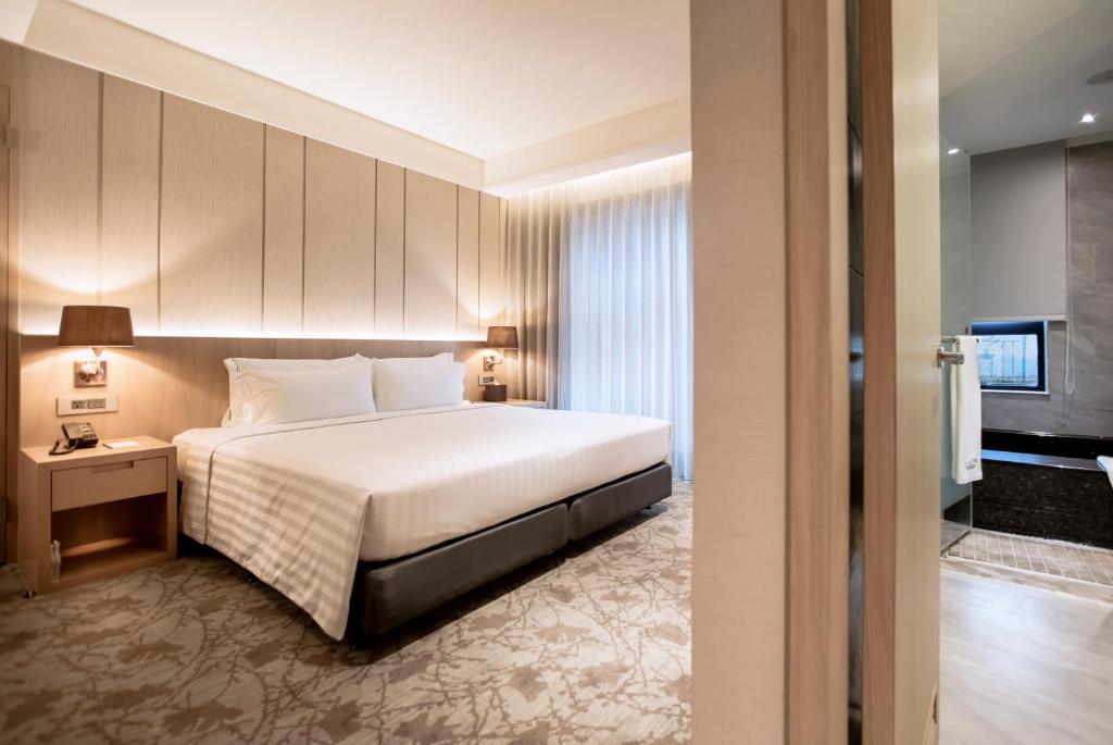 Postel nebo postele na pokoji v ubytování Hotel Valletta