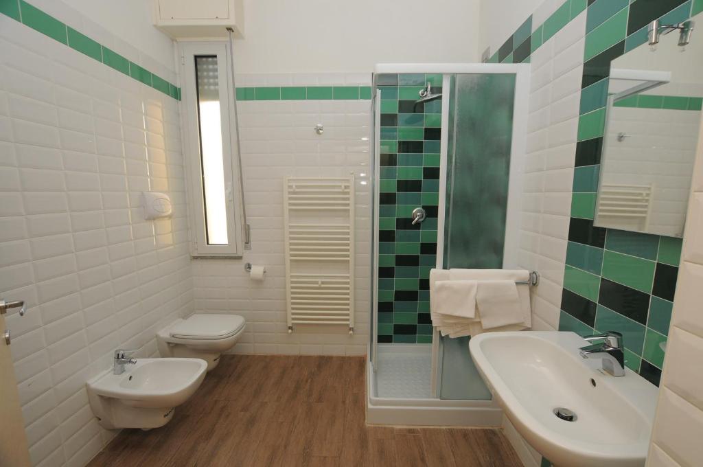 Koupelna v ubytování Hotel Renato