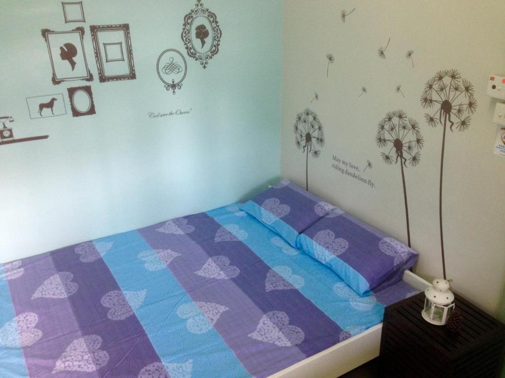 Letto o letti in una camera di YHA Ngong Ping SG Davis Youth Hostel