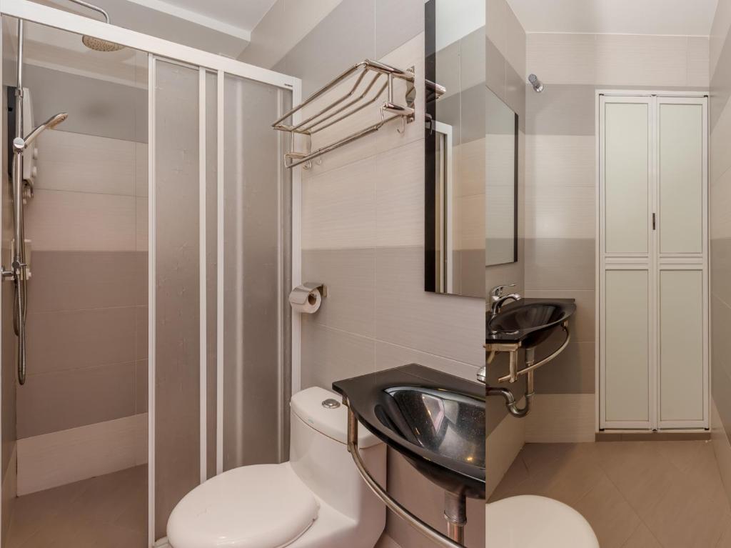 Koupelna v ubytování Sunshine Inn Plus