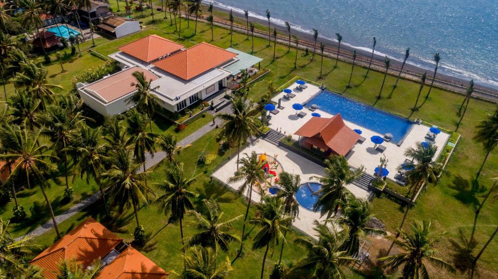 an aerial view of a resort with a swimming pool at Ketapang Indah Hotel in Banyuwangi