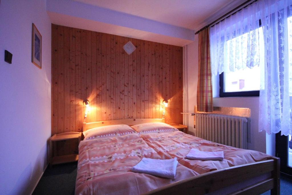 Postel nebo postele na pokoji v ubytování Pension Kubát