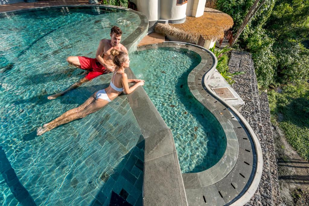 Bazén v ubytování tanadewa Resort Ubud Bali by Cross Collection nebo v jeho okolí