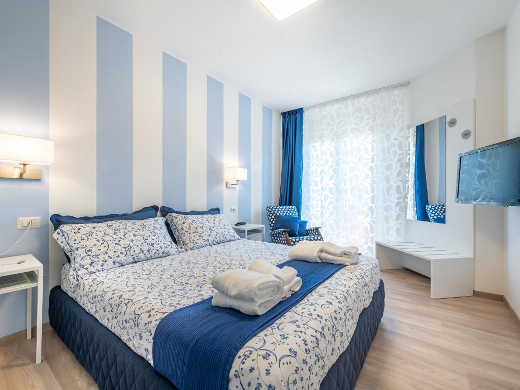 A bed or beds in a room at Le residenze di Carlà - Stampace