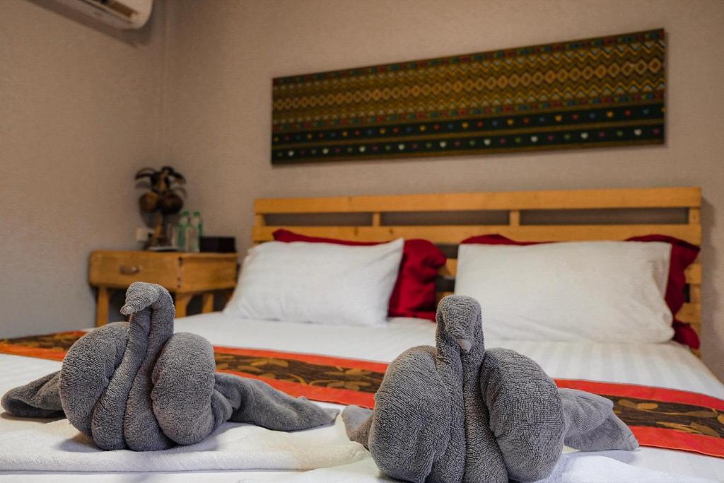 Postel nebo postele na pokoji v ubytování Cocco House
