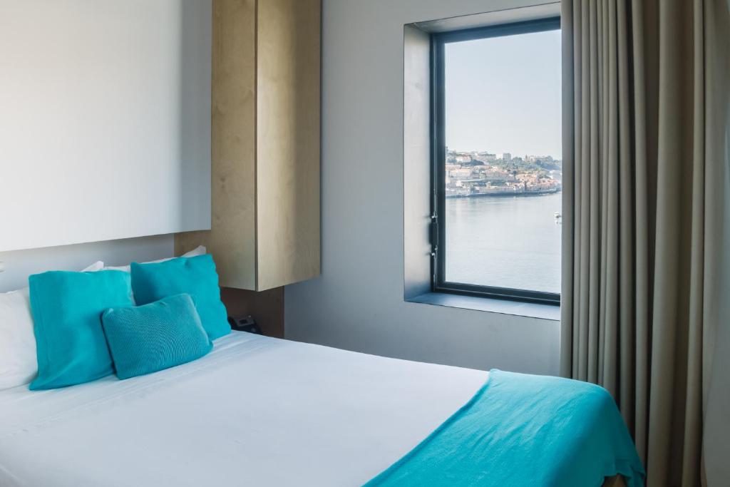 Postel nebo postele na pokoji v ubytování Oh! Porto Apartments