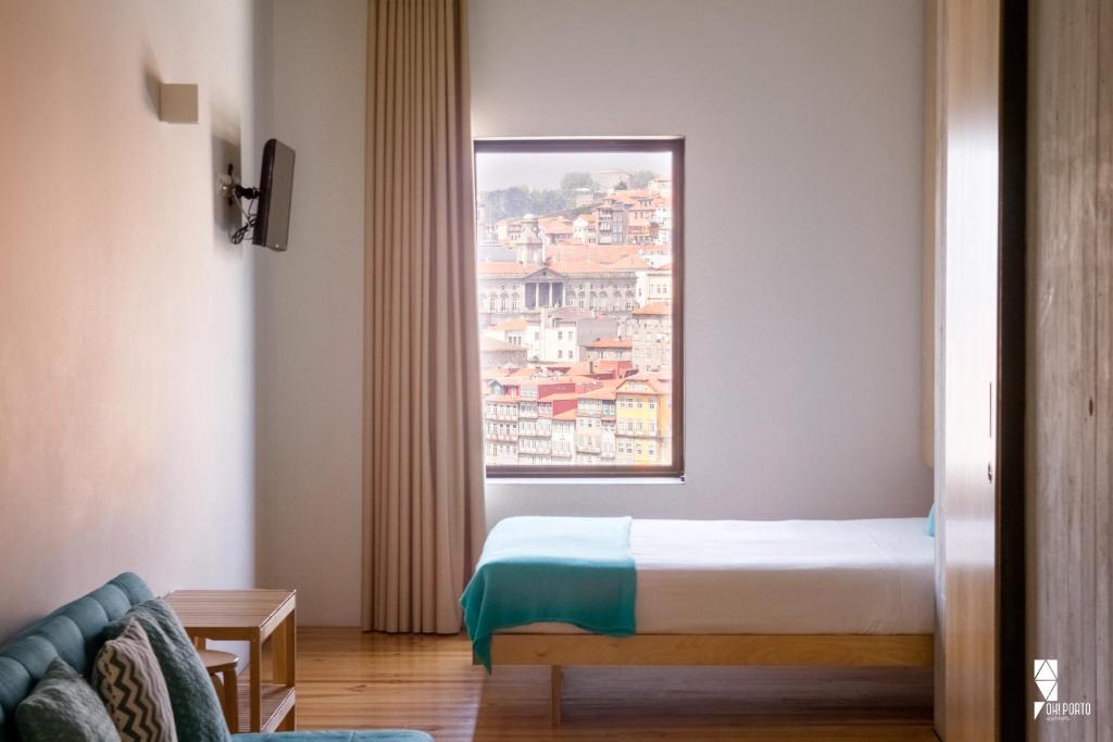 Postel nebo postele na pokoji v ubytování Oh! Porto Apartments