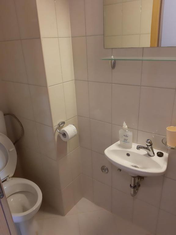 Kúpeľňa v ubytovaní Apartment Quattro