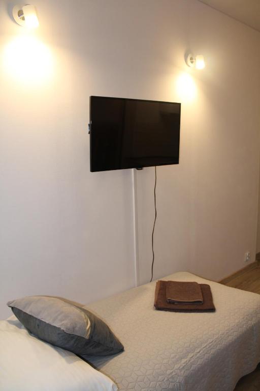 Posteľ alebo postele v izbe v ubytovaní Apartamenty przy Starym Rynku