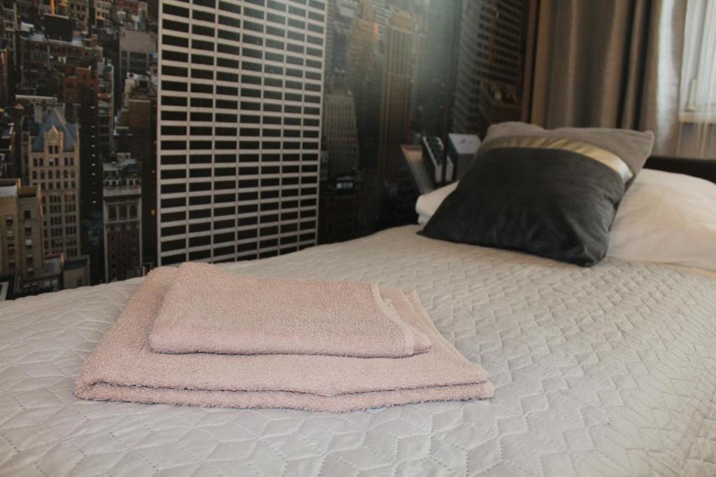 Posteľ alebo postele v izbe v ubytovaní Apartamenty przy Starym Rynku