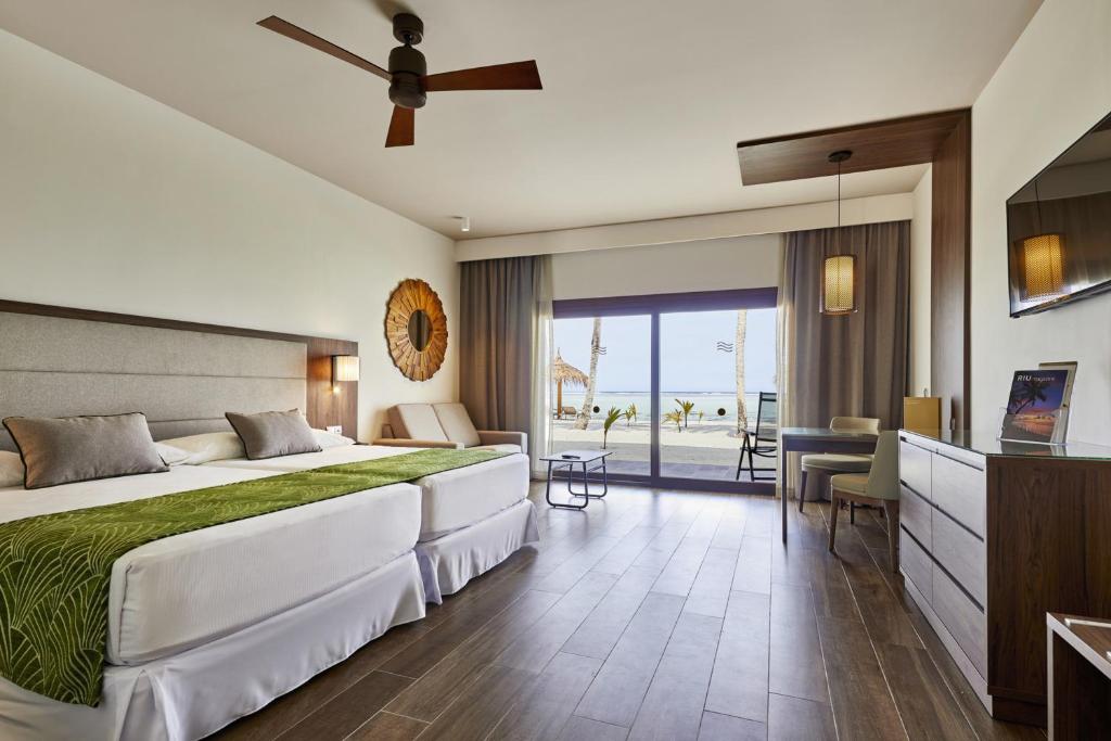 Postel nebo postele na pokoji v ubytování Riu Palace Maldivas- All Inclusive