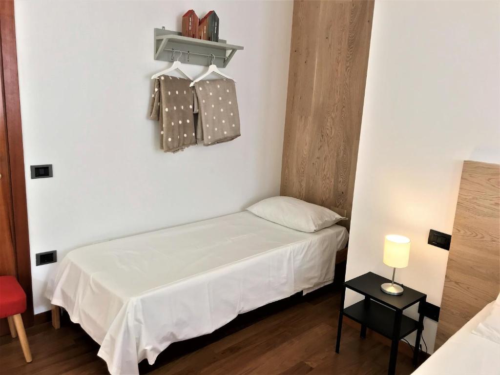 Postel nebo postele na pokoji v ubytování Green Corner Gelsomino