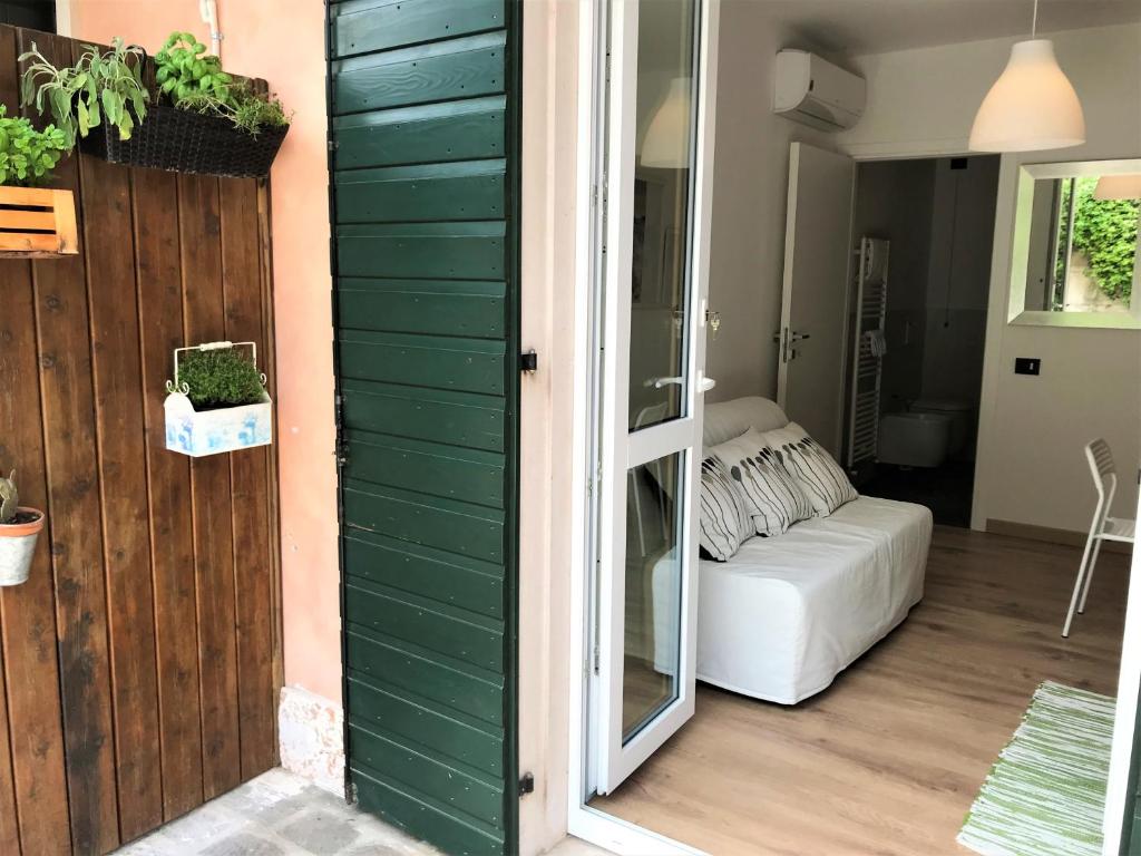Postel nebo postele na pokoji v ubytování Green Corner Gelsomino