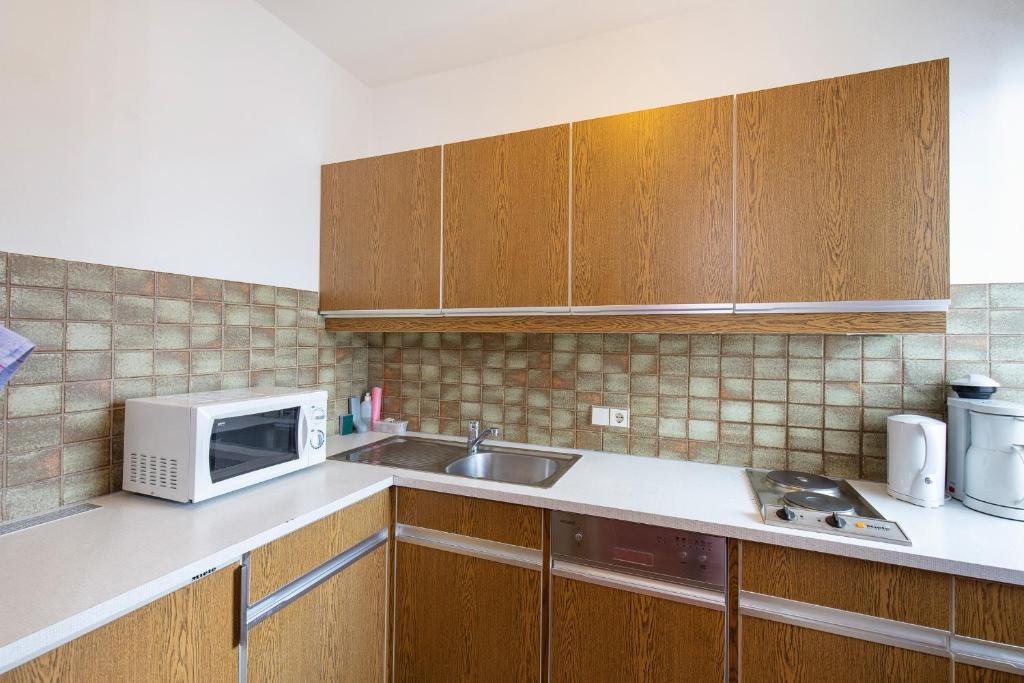 Kuchnia lub aneks kuchenny w obiekcie Appartements Zirmhof