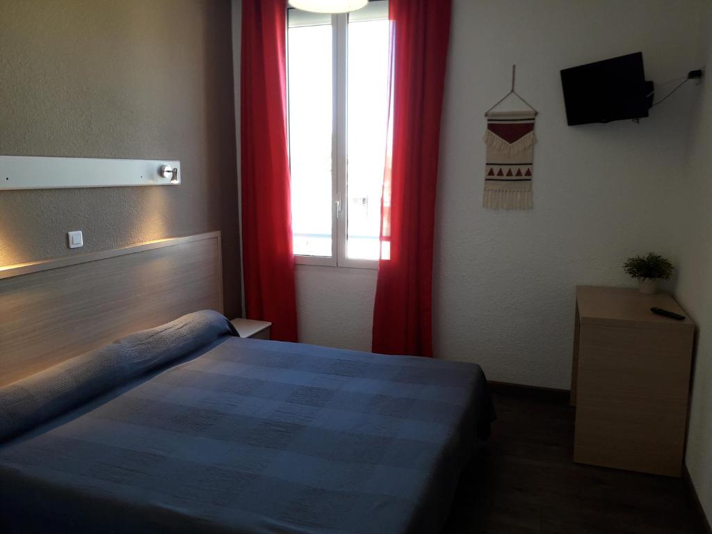 Postel nebo postele na pokoji v ubytování Hotel Le Terminus