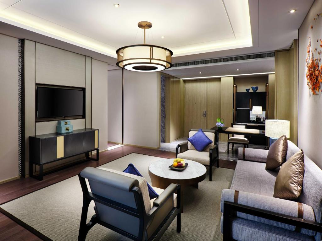 TV a/nebo společenská místnost v ubytování Primus Hotel Shanghai Sanjiagang - Offer Pudong International Airport and Disney shuttle