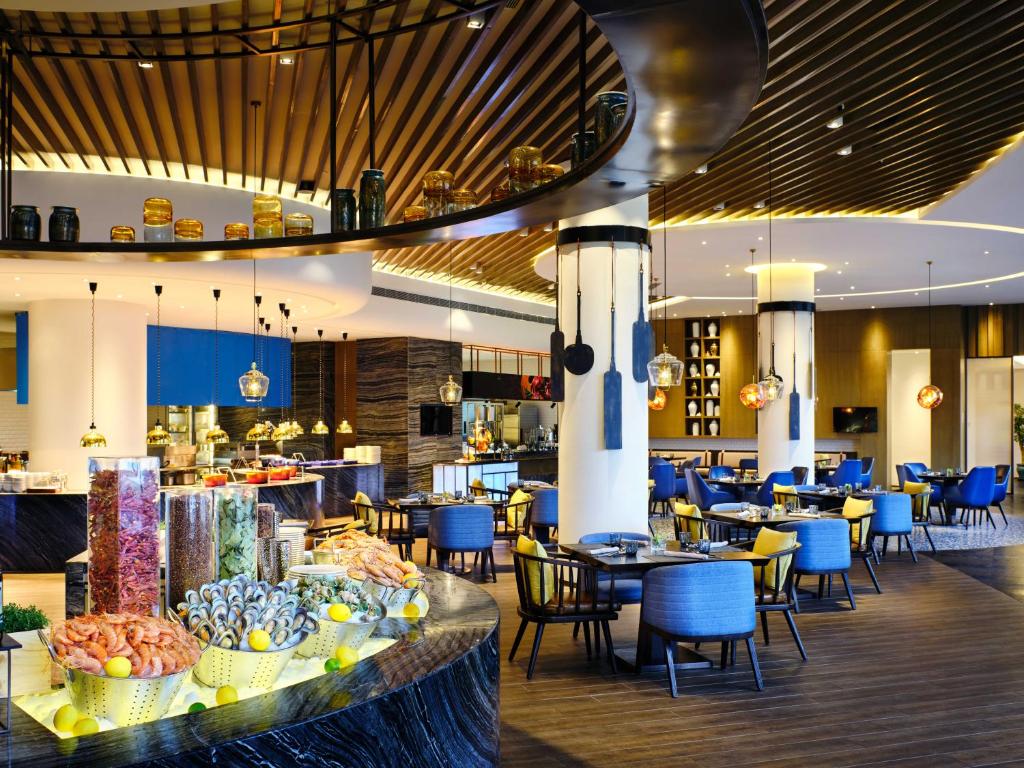 Restaurace v ubytování Primus Hotel Shanghai Sanjiagang - Offer Pudong International Airport and Disney shuttle